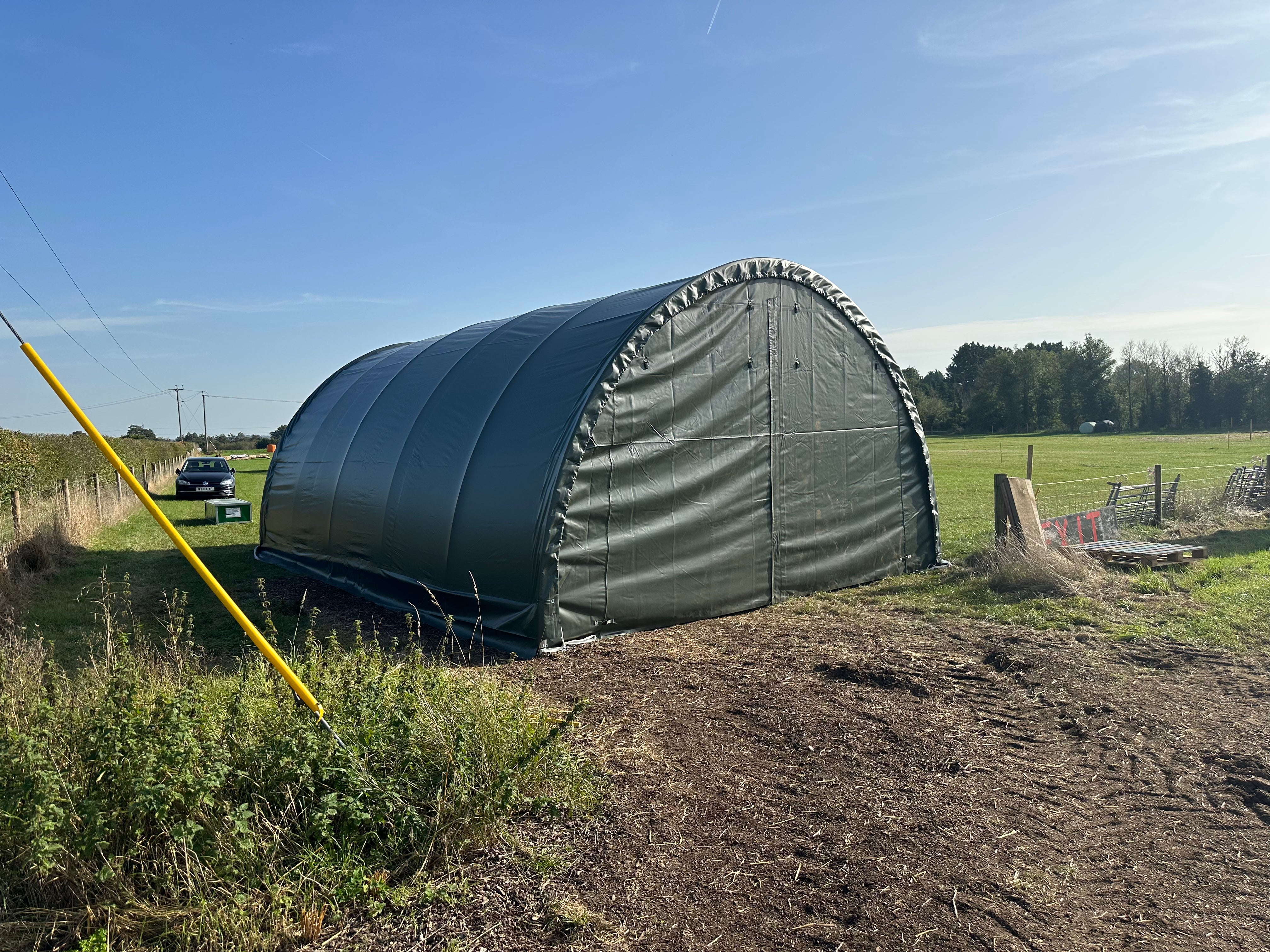 Single Trussed Industrial Storage Tent in a Farm