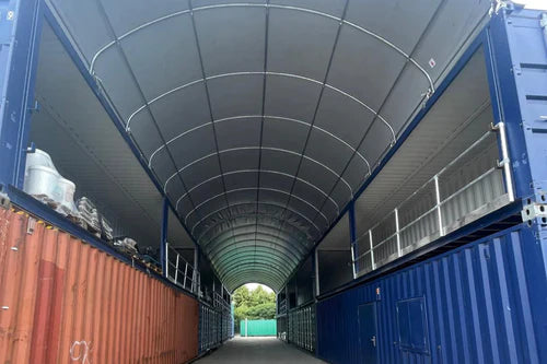 100ft long shelter creating all weather processing area